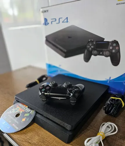 Ps4 Slim 1TB de memória, estado de novo, bem cuidado, completo só ligar e jogar, muito top