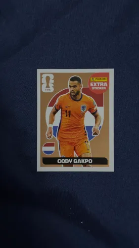 Figurinha extra copa 2026 - gakpo bronze