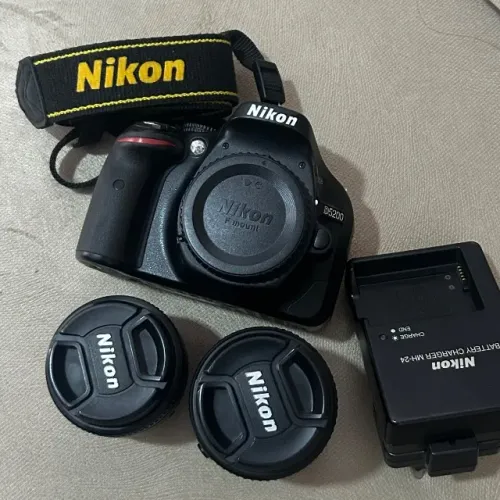 Nikon D5200 + 50mm 1.8 + 18-55 + Carregador