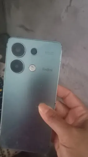 Celular not 13 com marca de uso .Pega tudo