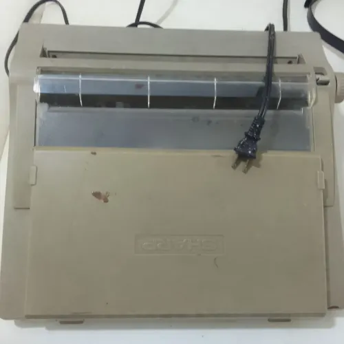 Máquina de escrever elétrica Sharp PA 3000