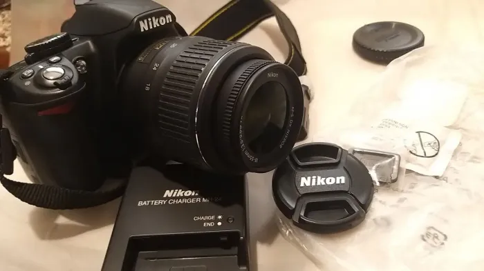 MAQUINA FOTOGRAFICA PROFISSIONAL NIKON D3100 ZERADA, LENTE  18-55mm Perfeita, leia!!!