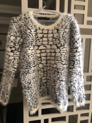 Suéter animal print peludo
