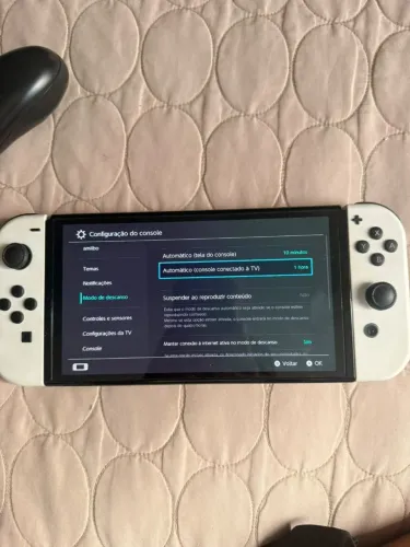 Vídeo Game Nintendo Switch versão OLED. Cor: Branco. 64gb