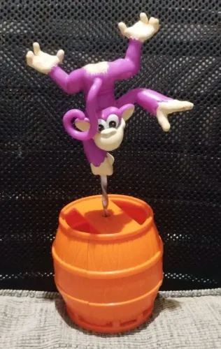 brinquedo interativo macaco equilibrista