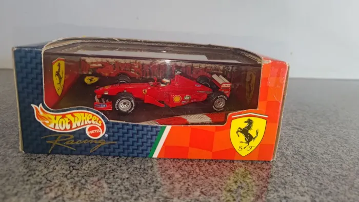 F1 Ferrari F399 1999 Michael Schumacher 1:43 Hot Wheels Racing - Na Caixa