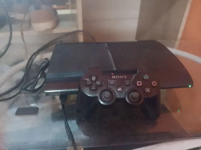 Vendo ps3 super slim desbloqueado com 14 jogos funcionando perfeitamente 