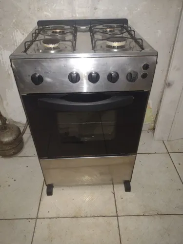 Fogão esmaltec 4 bocas todo inox praticamente novo pra hj temos entrega não e elétrico 