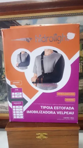 Tipóia estofada imobilizadora