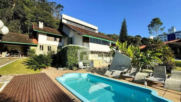 Casa com 4 dormitórios à venda, 358 m² por R$ 3.980. - Itacorubi - Florianópolis/SC