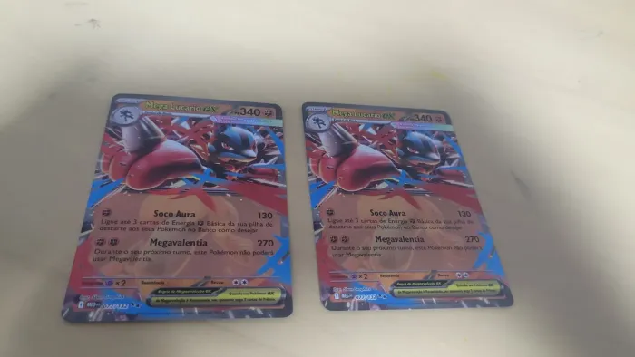 Pikachu Vmax 310 de poder mais 2 mega lucario ex 340 de poder