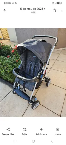 Carrinho com bebê conforto 