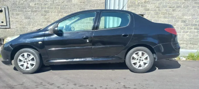 Peugeot 207 Sedan Passion XR 1.4 Flex 8V 4P 2012