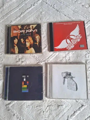 Cd's Bon Jovi , Aerosmith, Coldplay