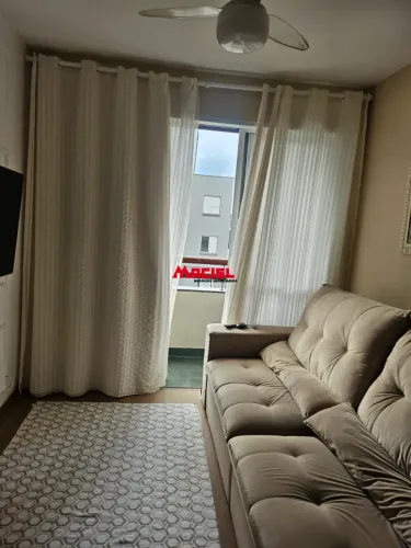 apartamento com moveis planejados nos quartos e cozinha a sacada vista para piscina uma va