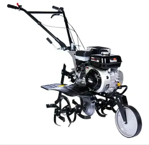 Mini trator. Toyama 7 HP gasolina 4 t com grade aradora. 