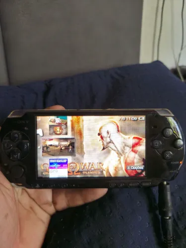 PSP versão 3000 acompanha carregador e 5 jogos
