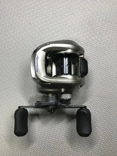 Carretilha Shimano Amenista (Curado201E) manivela esquerda