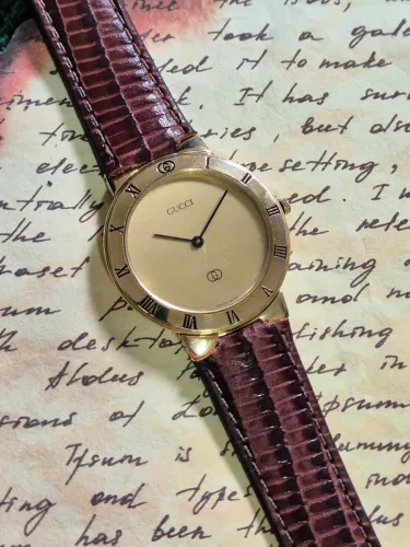 Relógio Gucci 3300M swiss vintage dourado 33mm anos 90