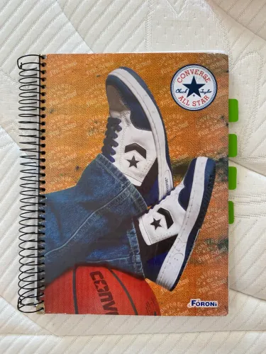 Caderno usado  com 150 folhas em branco ( usadas foram retiradas )
