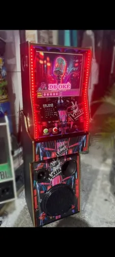 Vendo máquina de karaokê nova atualizada 2026