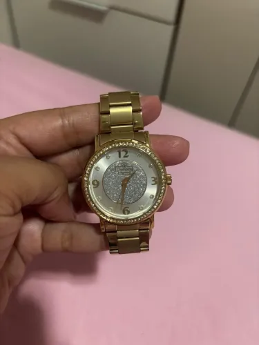 Relógio champion dourado
