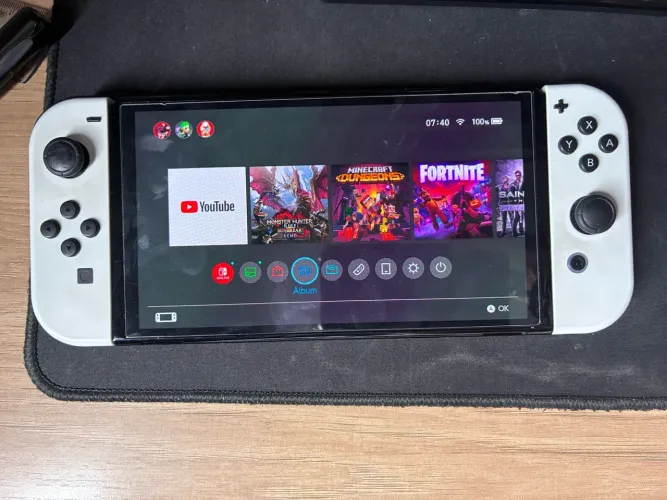 Vendo Nintendo switch oled com película microue Sd128 gb com 2 jogos