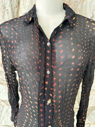 Camisão estilo bata/vestido transparente da Animale.