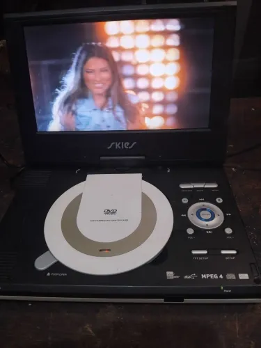 Dvd portatil skies, funcionando, ótimo estado.