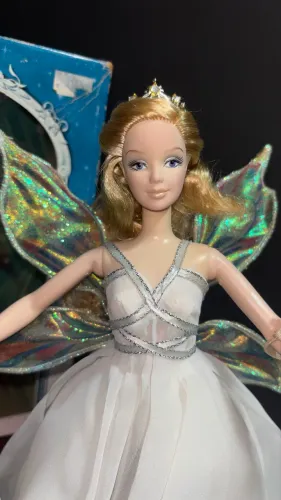 Barbie collector fada do dente