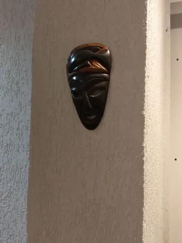 Máscara decorativa de parede