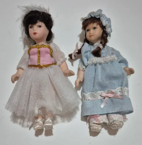 2 bonequinhas de porcelana da coleção Planeta DeAgostini - anos 2000