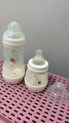 Mamadeira man e Philips pétala