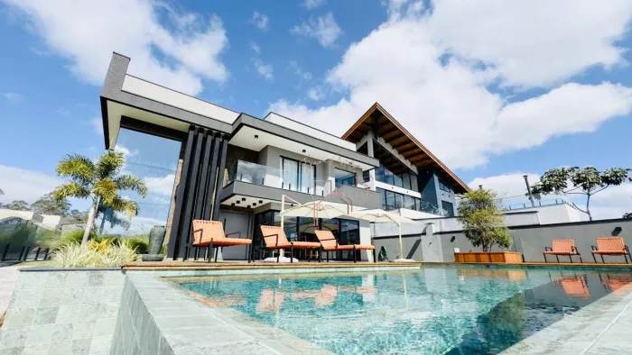 Casa com 4 dormitórios à venda, 380 m² por R$ 4.028.000,00 - Condomínio Reserva Ibirapitan