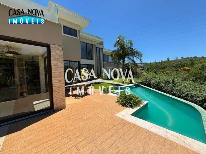 Casa com 5 dormitórios à venda, 452 m² por R$ 5.490.000,00 - Condomínio Campo de Toscana -