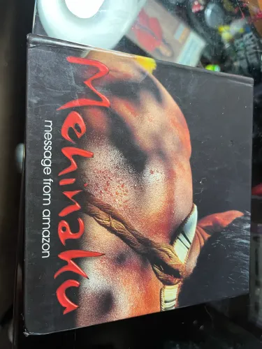 mehinaku - message from amazon cd duplo com livreto 2001