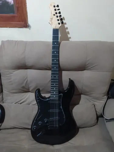 Guitarra Tagima canhota tw500 - estado de nova, com os plásticos ainda