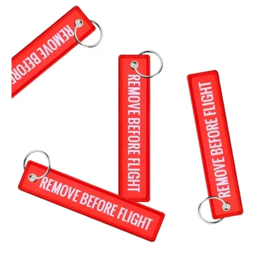 Chaveiro Remove Before Flight. Retire em mãos ou por app de entrega