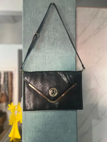 Bolsa preta carmen steffens envelope