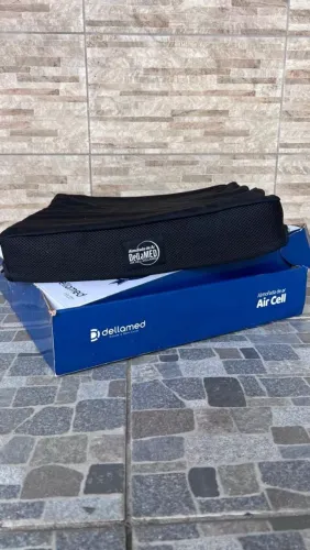 Almofada para a cadeira de roda antiscara.