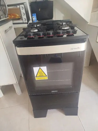 Fogão 4 quatro com tampa de vidro marca Mueller 