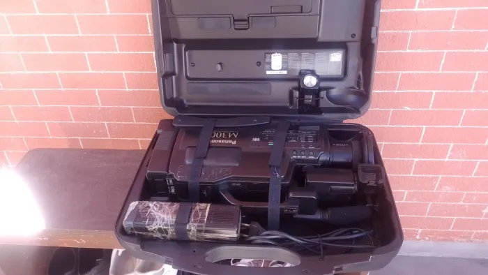 Relíquias, equipamentos de foto e filmagem.