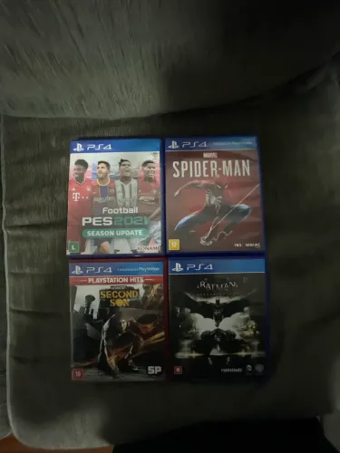 4 jogos de ps4 ( Spider man , Batman arkham knight, Infamous second son e PES 2021