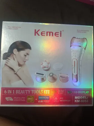 Depilador elétrico kemei 6 em 1 recarregável para corpo e rosto rosa.