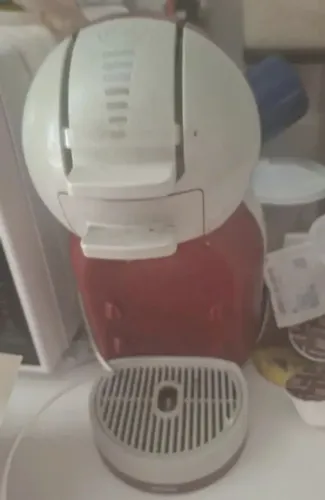 Maquina de cafe dolce gusto em ótimo estado e funcionando bem