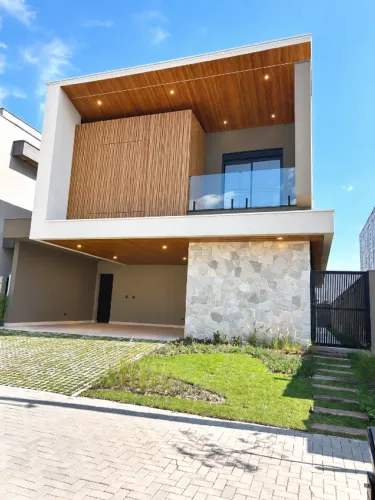Casa Áurea no Terras Alpha | 5 suítes, piscina e projeto Ohira & Nogata