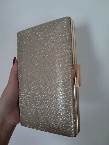 Bolsa clutch dourada de festa