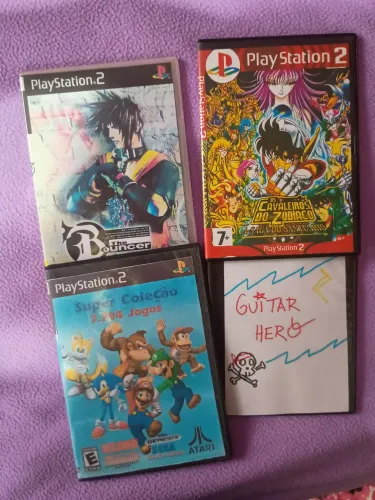 Lote de jogos PS2 -Guitar Hero, os cavaleiros do zodíaco,The bouncer ,e um cd com vários
