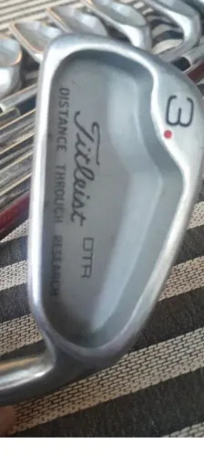Tacos de golfe titleist