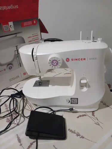Máquina de costura portátil singer